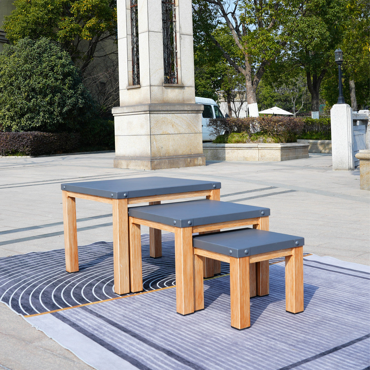 Direct Wicker All aluminum outdoor three-piece set can accommodate portable square table