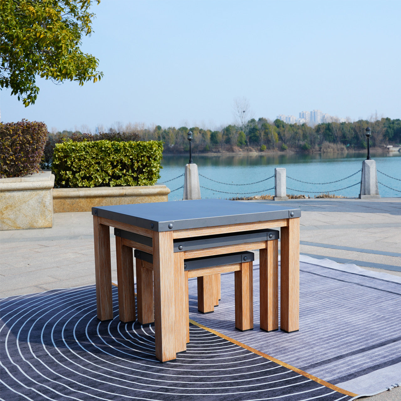 Direct Wicker All aluminum outdoor three-piece set can accommodate portable square table
