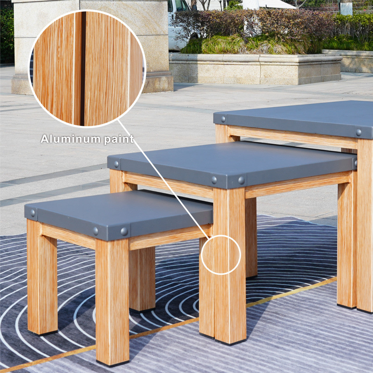 Direct Wicker All aluminum outdoor three-piece set can accommodate portable square table